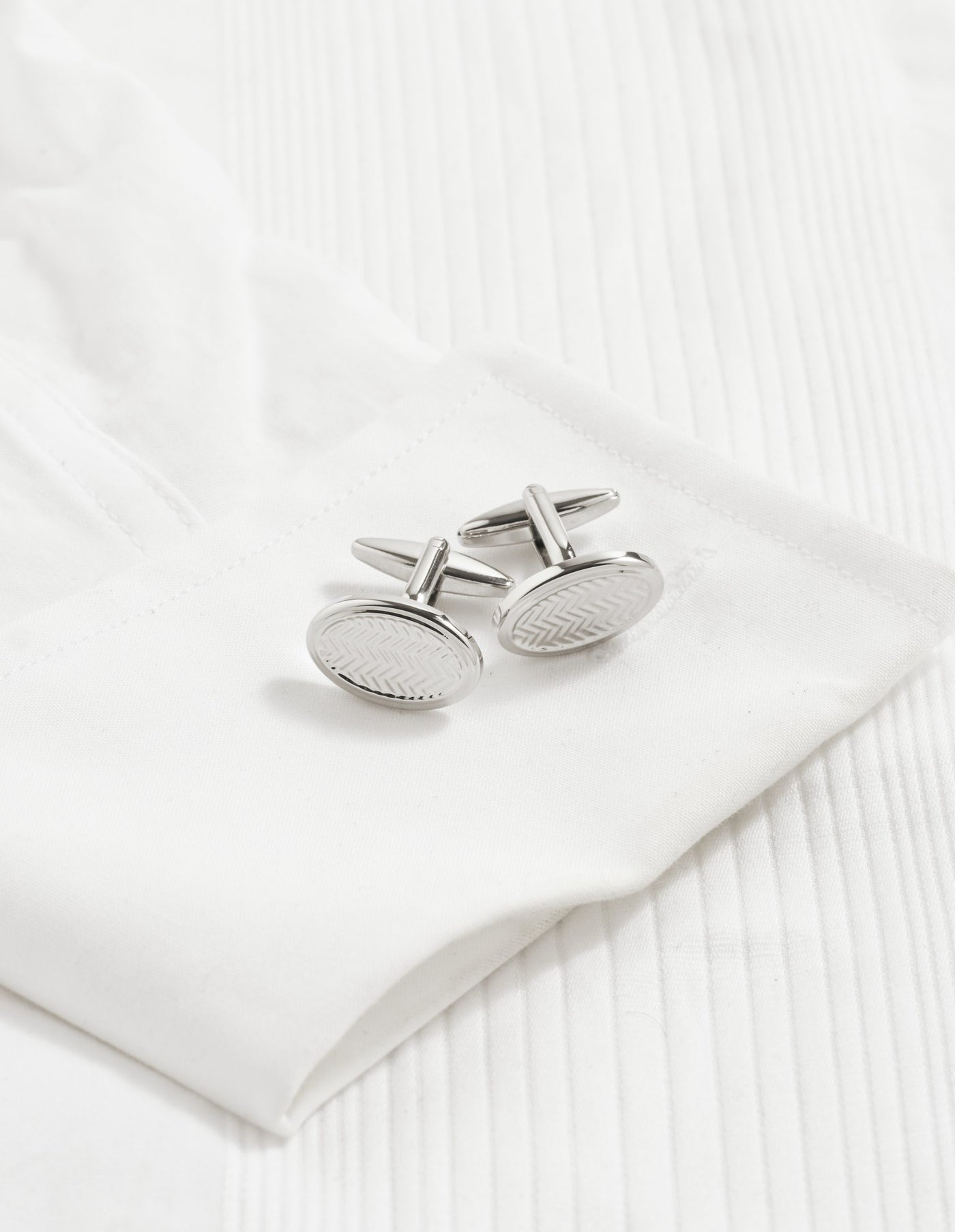 Rhodium Plated Oval Herringbone Patterned Cufflinks