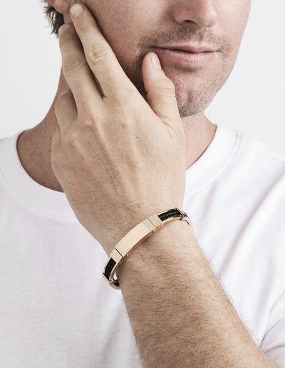Polished Ion Plated Rose Gold Stainless Steel Bracelet with Double Strand Braided Black Leather