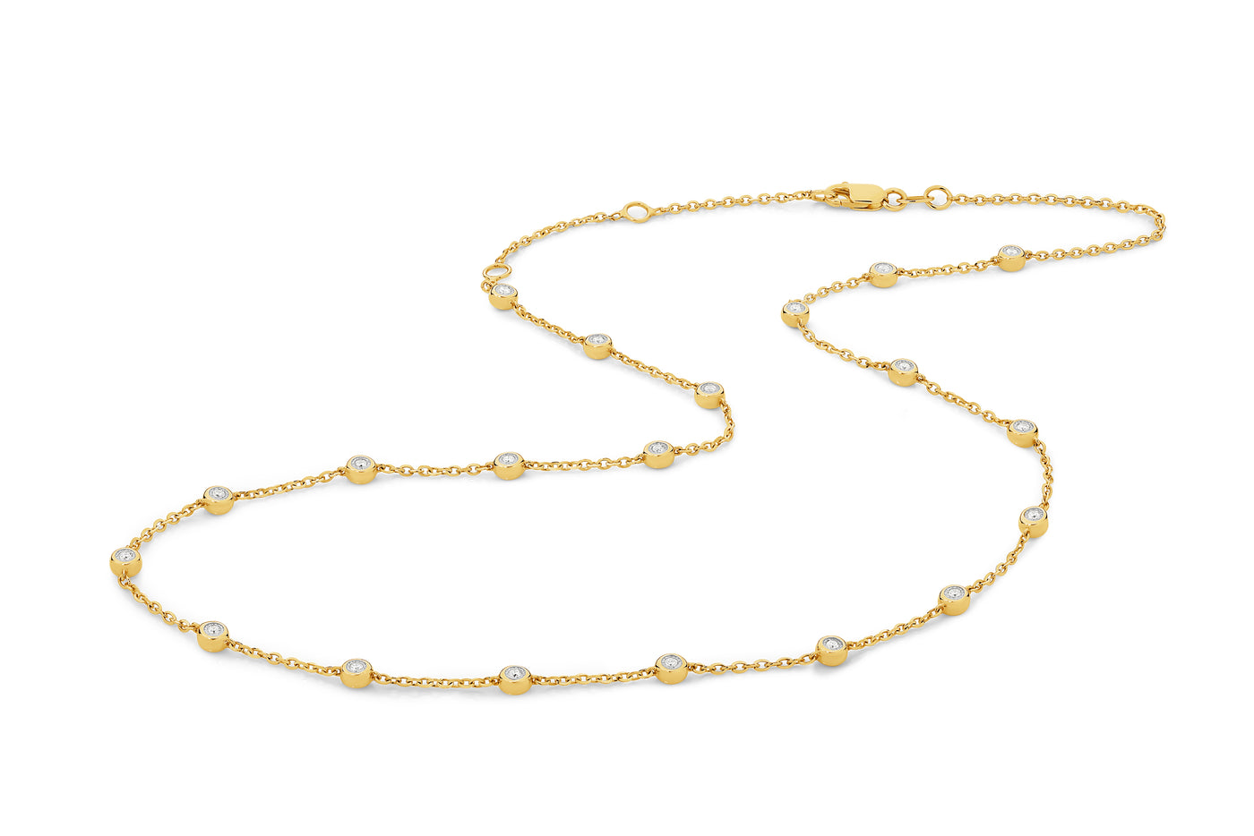 Two-sided yellow gold necklace with bezel-set diamonds. Available in 9ct and 18ct gold from Alexander Jewellers
