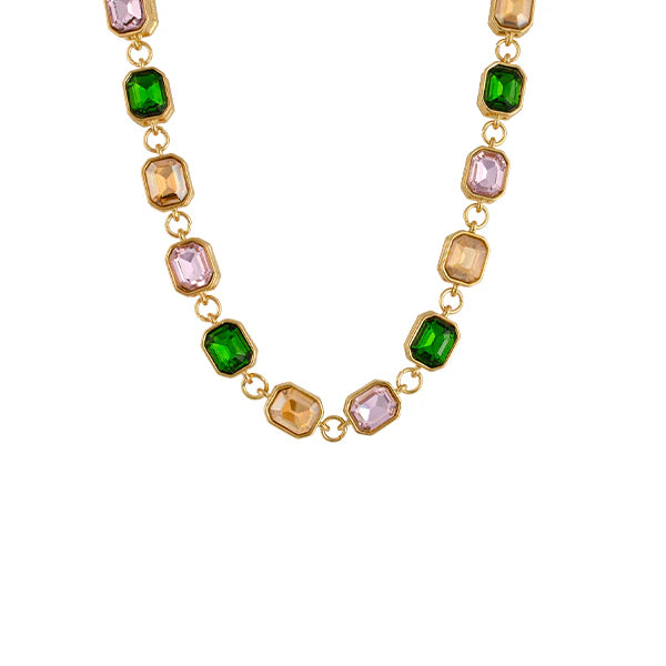 Rosalie Necklace flatlay – emerald-cut glass stones in gold setting